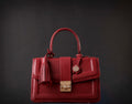 Red leather handbag