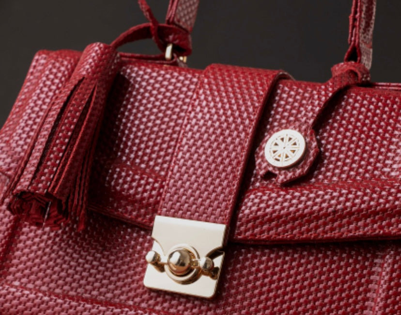 Red leather handbag