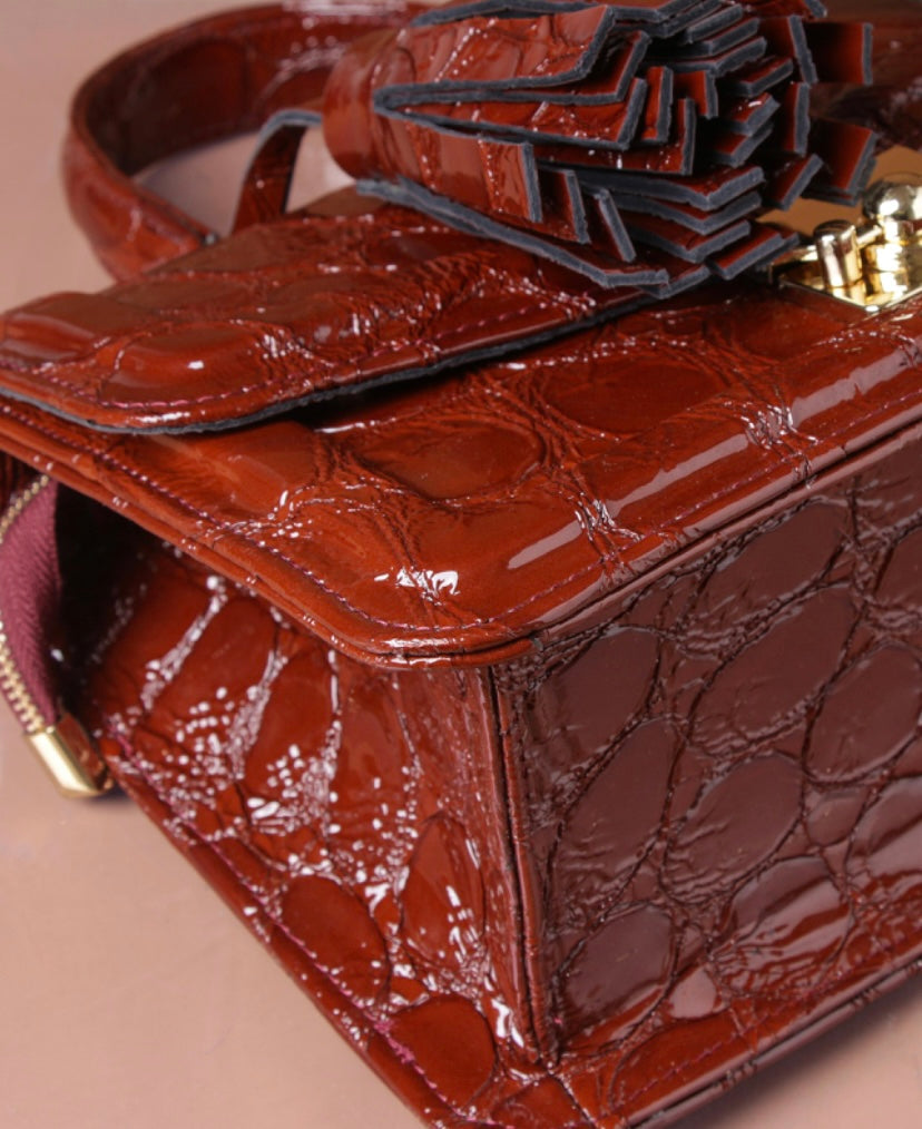 Asmaupoise wine leather handbag